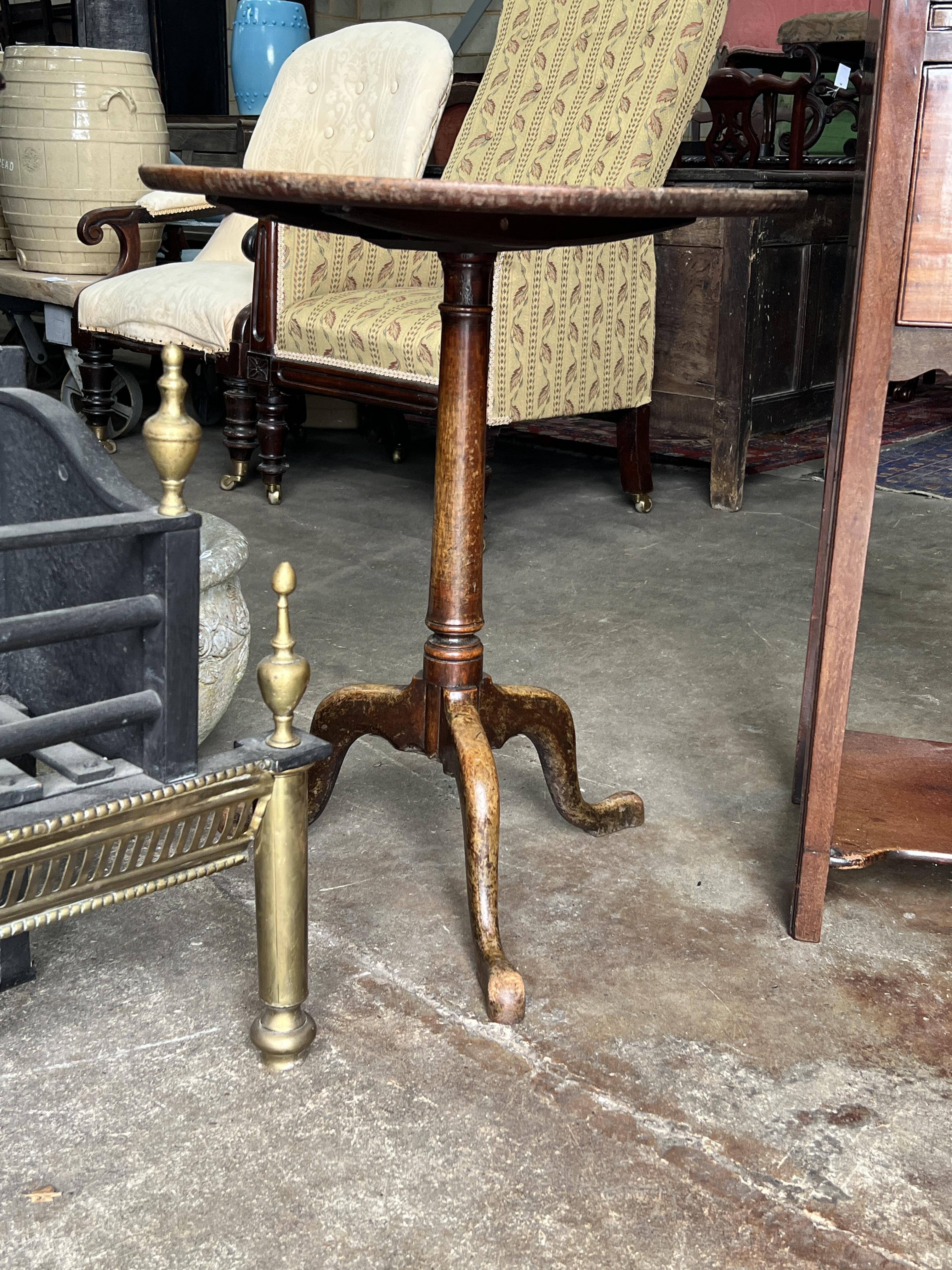 A George III mahogany tray top bedside cupboard, width 33cm, depth 33cm, height 81cm together with a 19th century circular tilt top wine table